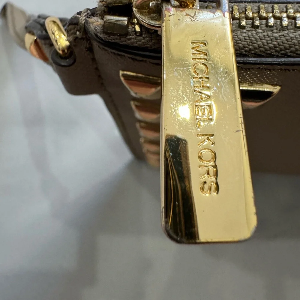 Michael Kors Tan and Gold Clutch Elegant and Versatile